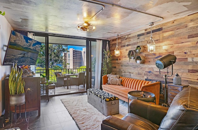 living room featuring wood walls