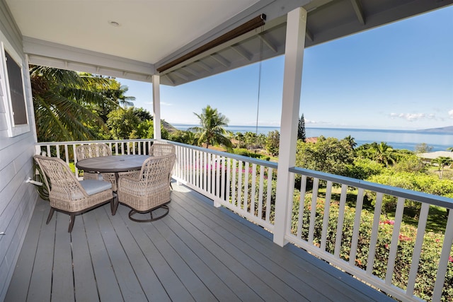 deck featuring a water view