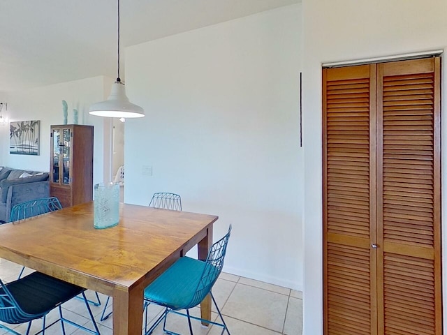 unfurnished dining area with light tile floors