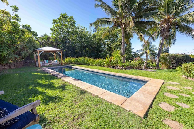 view of pool featuring a yard and a gazebo