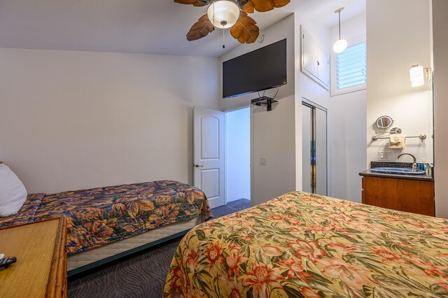 bedroom with sink and ceiling fan