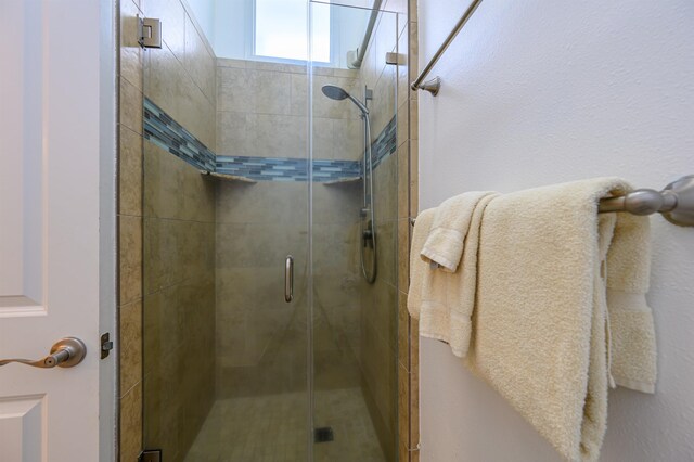 bathroom with an enclosed shower