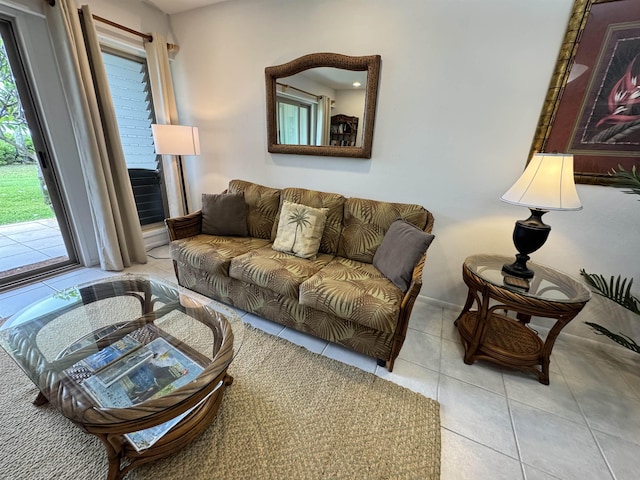 living area with tile patterned floors