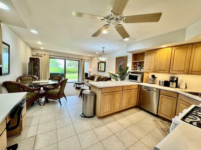 kitchen featuring stainless steel dishwasher, white microwave, recessed lighting, a peninsula, and light countertops