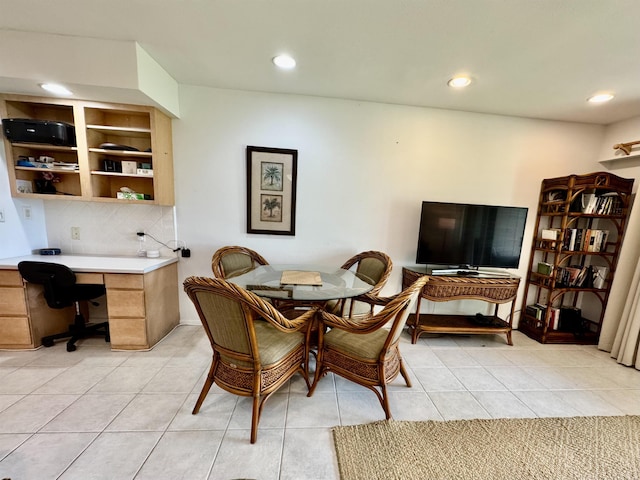 dining room with light tile patterned floors and recessed lighting