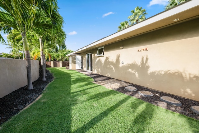 view of yard with fence