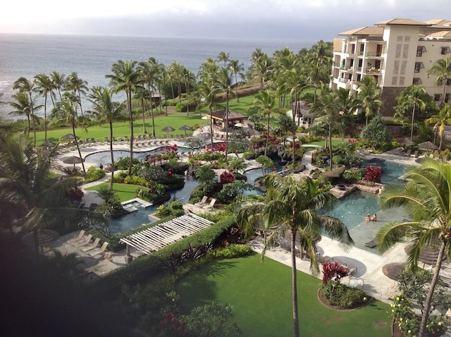 drone / aerial view with a water view