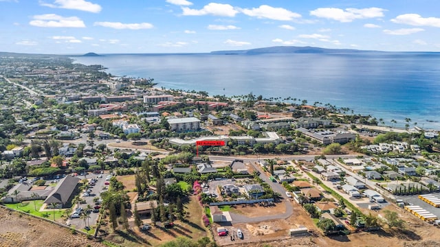 aerial view featuring a water and mountain view