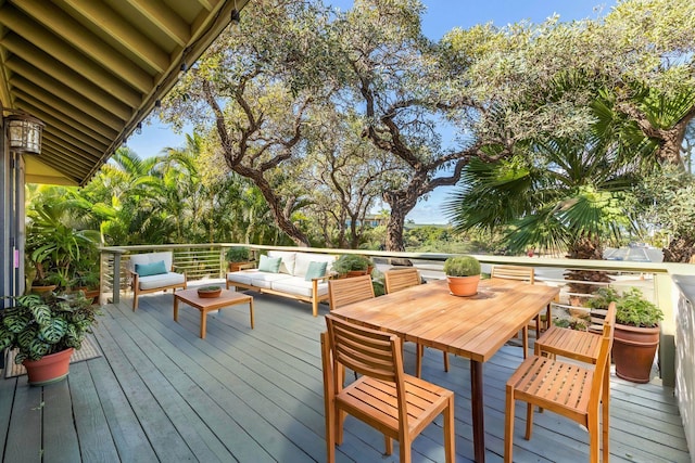 wooden deck with outdoor lounge area