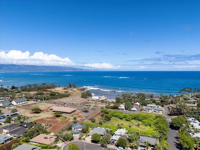 drone / aerial view featuring a water view and a residential view
