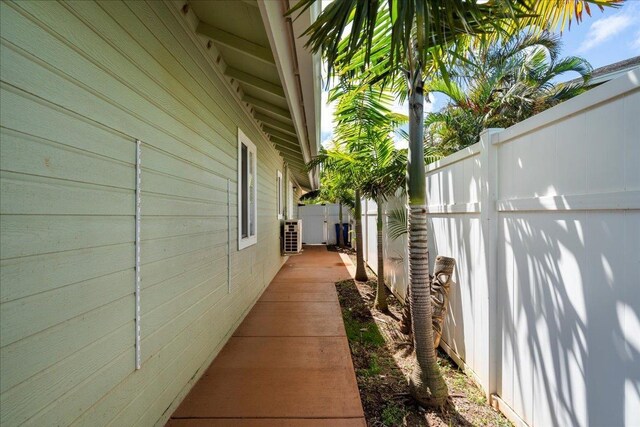 view of property exterior with a fenced backyard