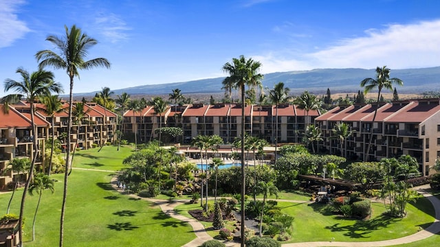 surrounding community with a residential view and a mountain view
