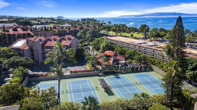birds eye view of property with a mountain view