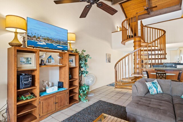 stairs featuring high vaulted ceiling, wood ceiling, ceiling fan, and tile patterned floors