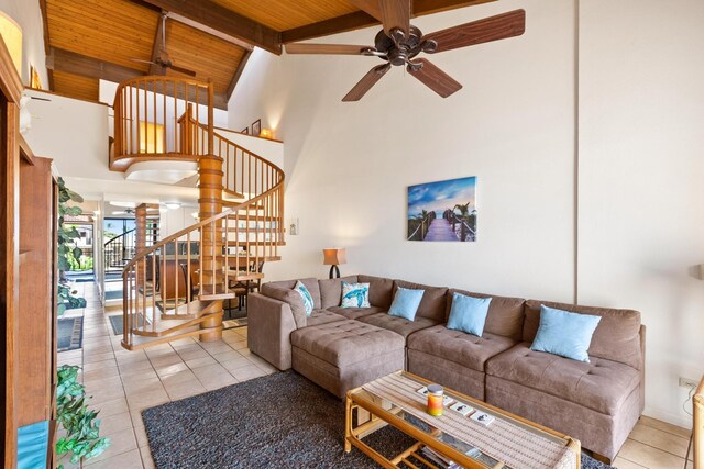 tiled living room with high vaulted ceiling, ceiling fan, and wooden ceiling