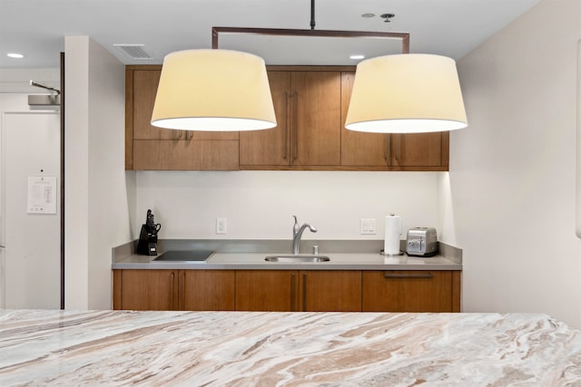 kitchen featuring sink and stovetop