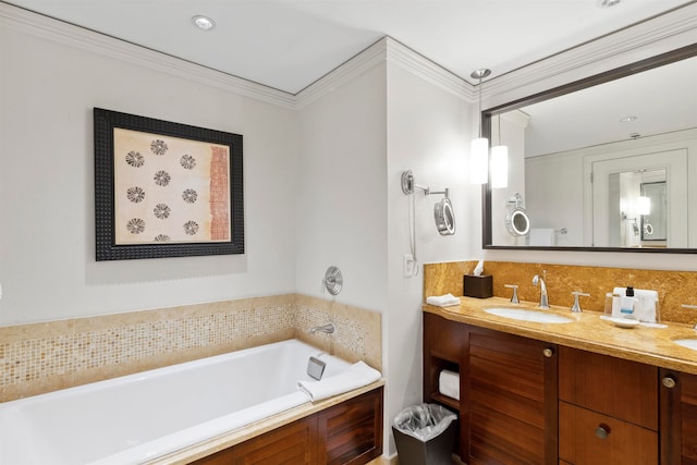 bathroom featuring a bath to relax in, crown molding, and dual bowl vanity