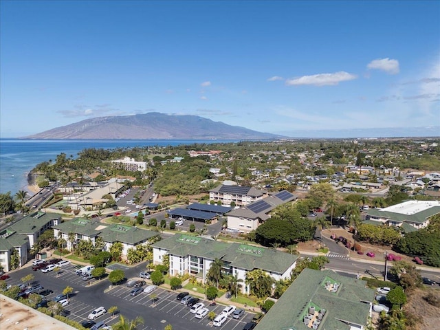 bird's eye view with a water and mountain view