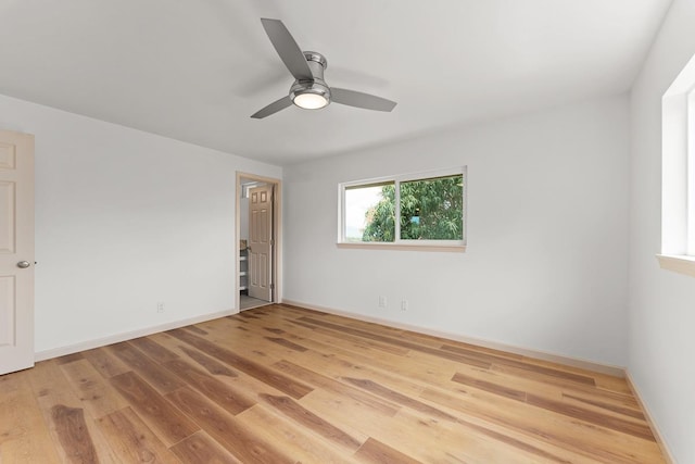 495 Kaiolohia St, Kihei, HI 96753 - spare room with a ceiling fan, light wood finished floors, and baseboards