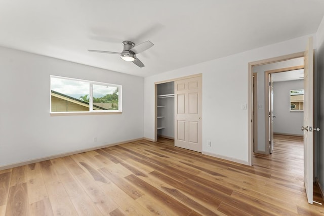 495 Kaiolohia St, Kihei, HI 96753 - unfurnished bedroom featuring baseboards, a ceiling fan, a closet, and light wood finished floors