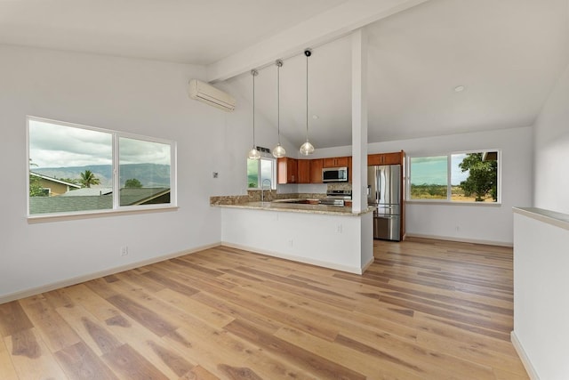 495 Kaiolohia St, Kihei, HI 96753 - kitchen featuring lofted ceiling with beams, stainless steel appliances, brown cabinets, a wall unit AC, and a peninsula