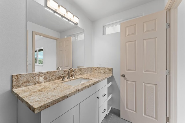 495 Kaiolohia St, Kihei, HI 96753 - bathroom with tile patterned floors and vanity