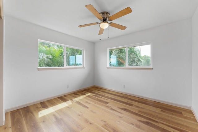 495 Kaiolohia St, Kihei, HI 96753 - spare room featuring ceiling fan, baseboards, and light wood-style floors