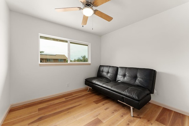 495 Kaiolohia St, Kihei, HI 96753 - living area with wood finished floors, a ceiling fan, and baseboards