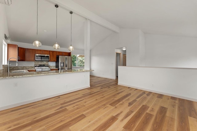 495 Kaiolohia St, Kihei, HI 96753 - kitchen featuring lofted ceiling with beams, light stone counters, appliances with stainless steel finishes, a sink, and pendant lighting