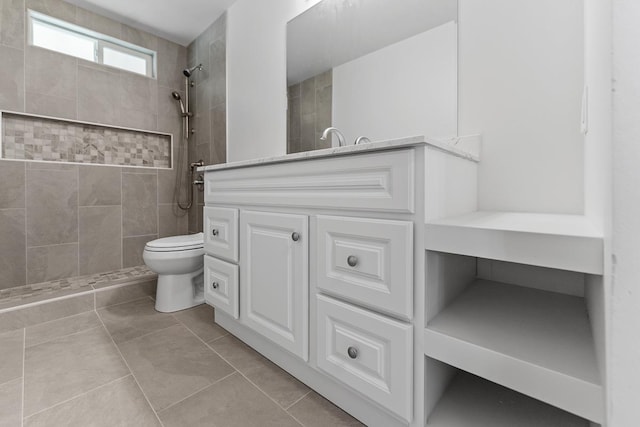 495 Kaiolohia St, Kihei, HI 96753 - bathroom with tile patterned floors, tiled shower, toilet, and vanity