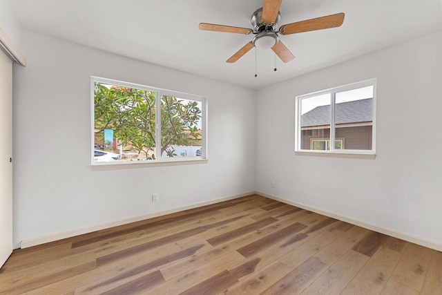 495 Kaiolohia St, Kihei, HI 96753 - unfurnished room featuring wood-type flooring, ceiling fan, and baseboards