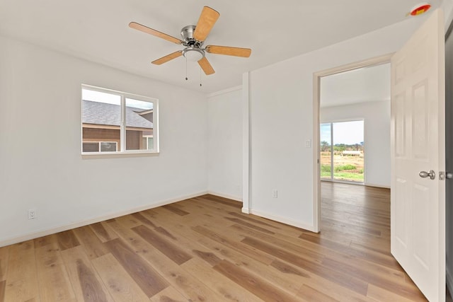 495 Kaiolohia St, Kihei, HI 96753 - empty room with baseboards, light wood-type flooring, and ceiling fan