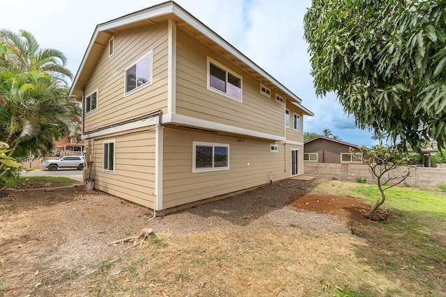 495 Kaiolohia St, Kihei, HI 96753 - rear view of house with fence