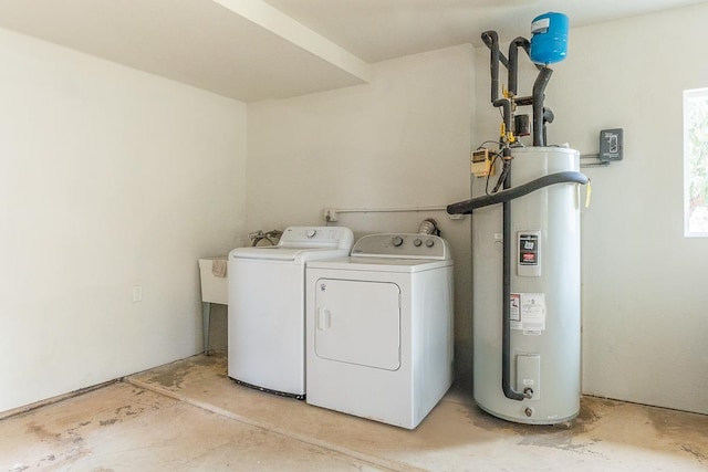 495 Kaiolohia St, Kihei, HI 96753 - washroom featuring washer and clothes dryer, laundry area, and electric water heater