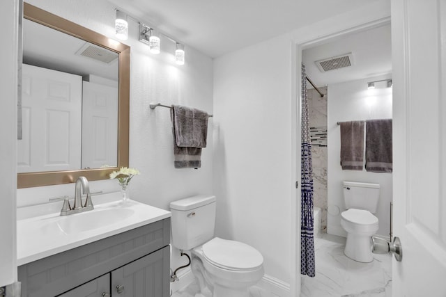 bathroom with vanity, toilet, and a shower with shower curtain