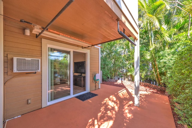 view of patio / terrace with a wall mounted AC