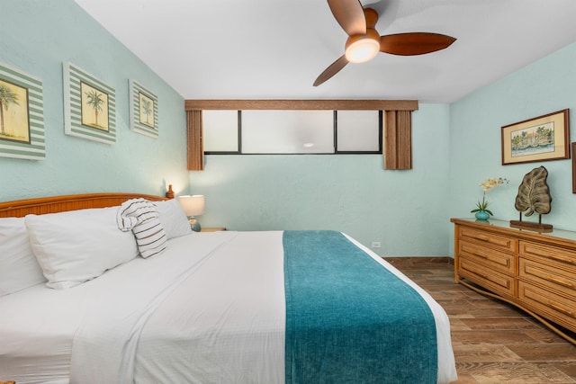 bedroom featuring ceiling fan and wood-type flooring