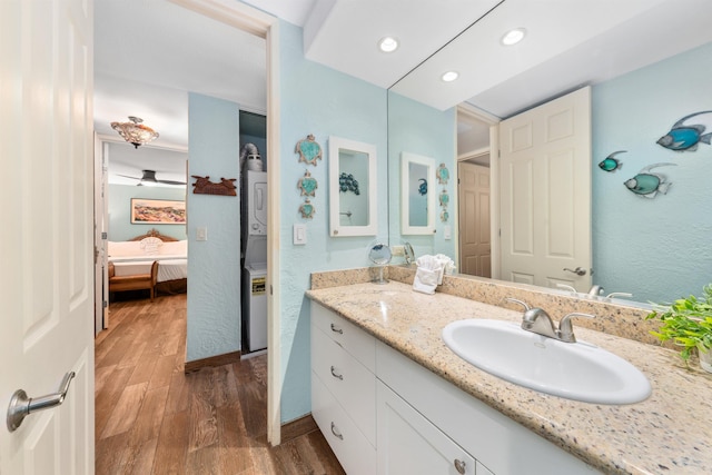 bathroom featuring wood-type flooring and vanity