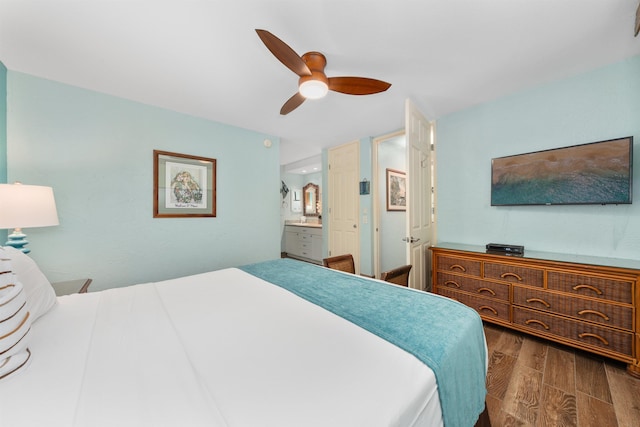 bedroom with ceiling fan and connected bathroom