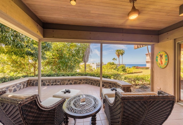 view of patio featuring a water view