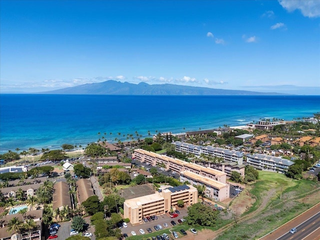 bird's eye view featuring a water and mountain view