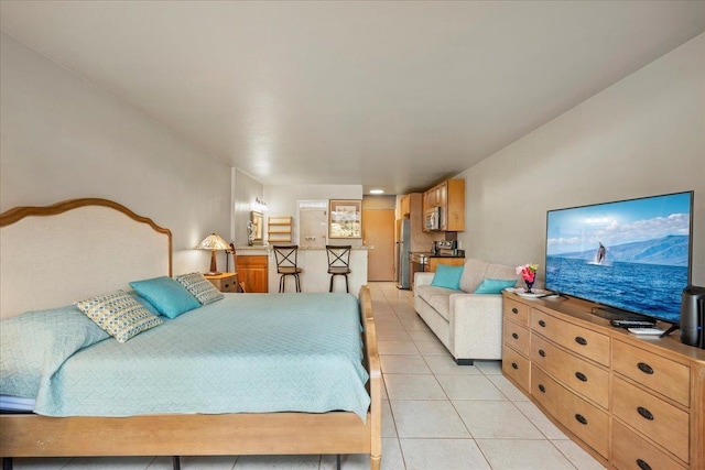 tiled bedroom featuring stainless steel fridge