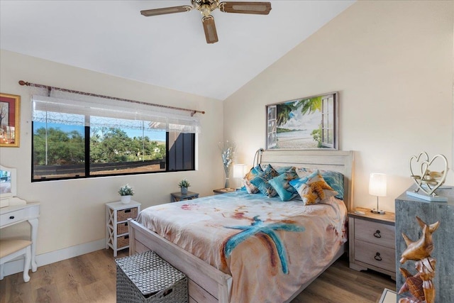 bedroom featuring vaulted ceiling, ceiling fan, and hardwood / wood-style flooring