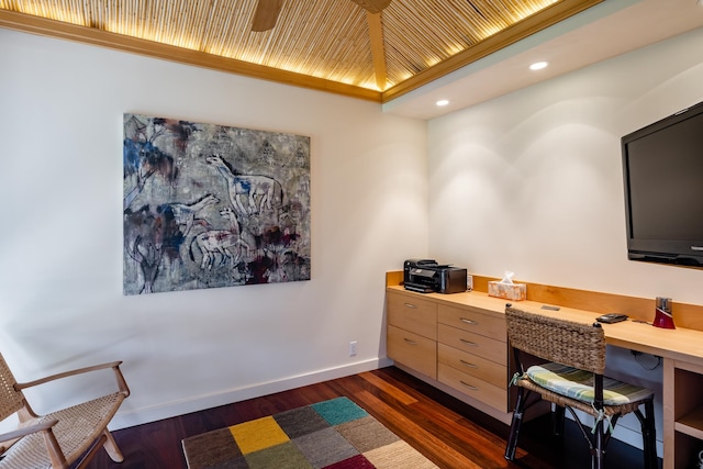 office space featuring built in desk and dark hardwood / wood-style floors