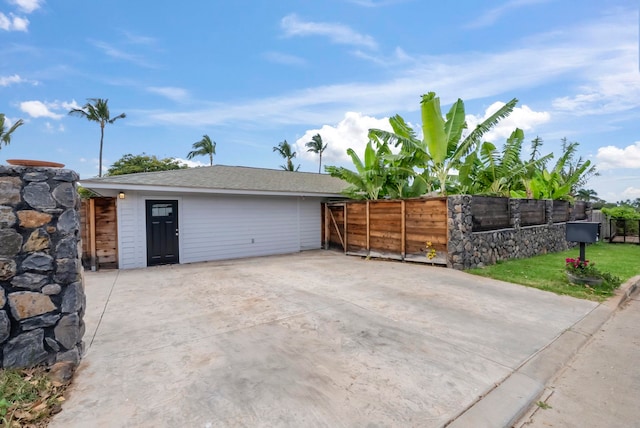 garage with fence