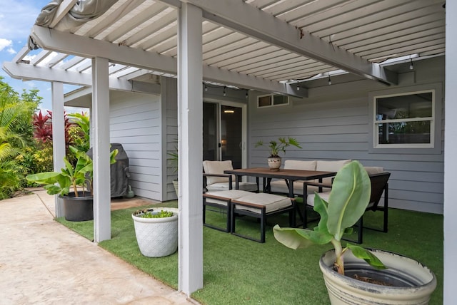 view of patio featuring a pergola