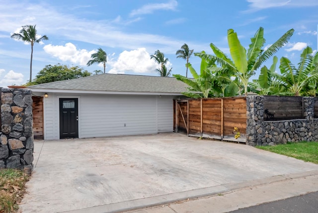 garage featuring fence