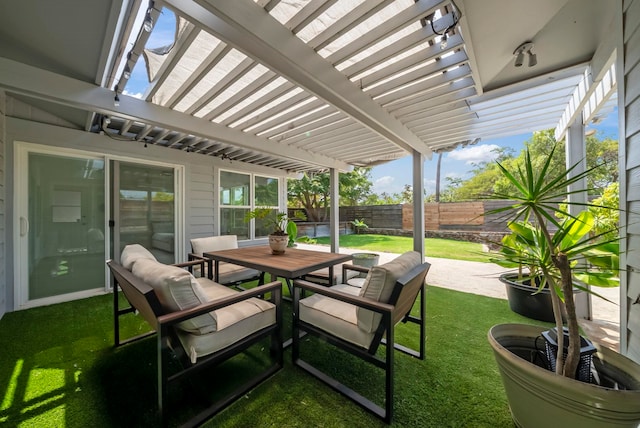 view of patio / terrace with a fenced backyard, outdoor dining space, and a pergola