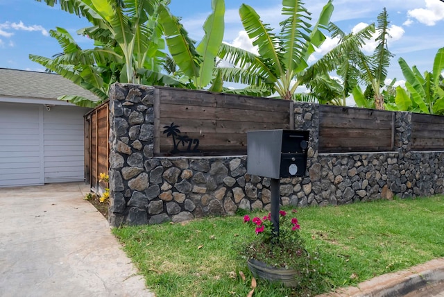 community / neighborhood sign featuring fence