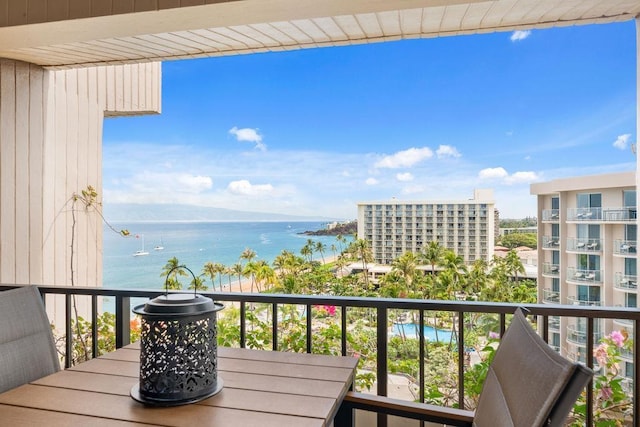 balcony featuring a water view